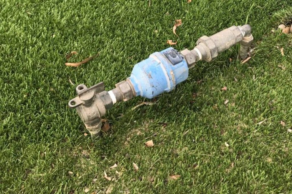 Water meter tap at the front boundary of a Huon Valley home